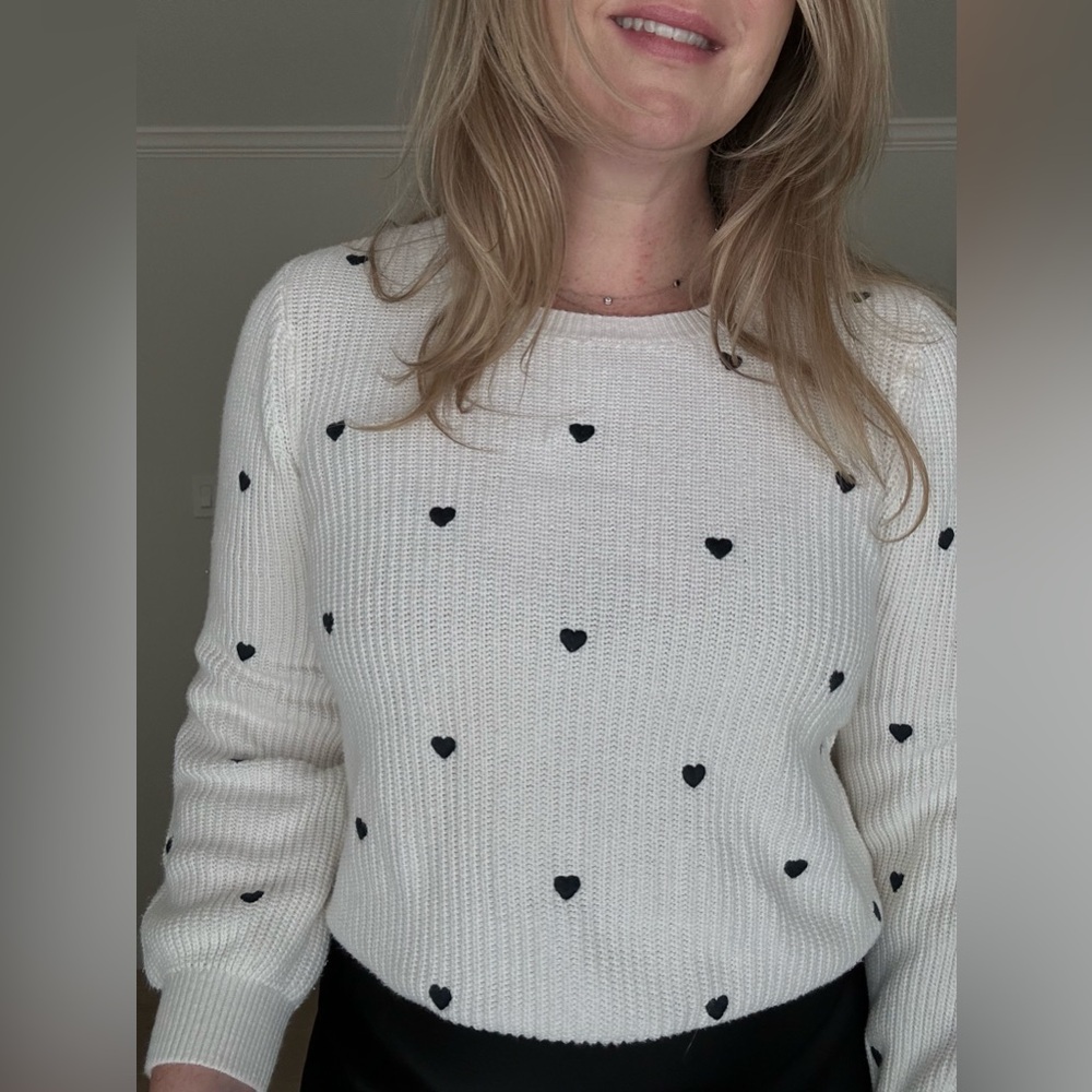 Cute black and white heart knit sweater. Size Medium. Lucky Brand
